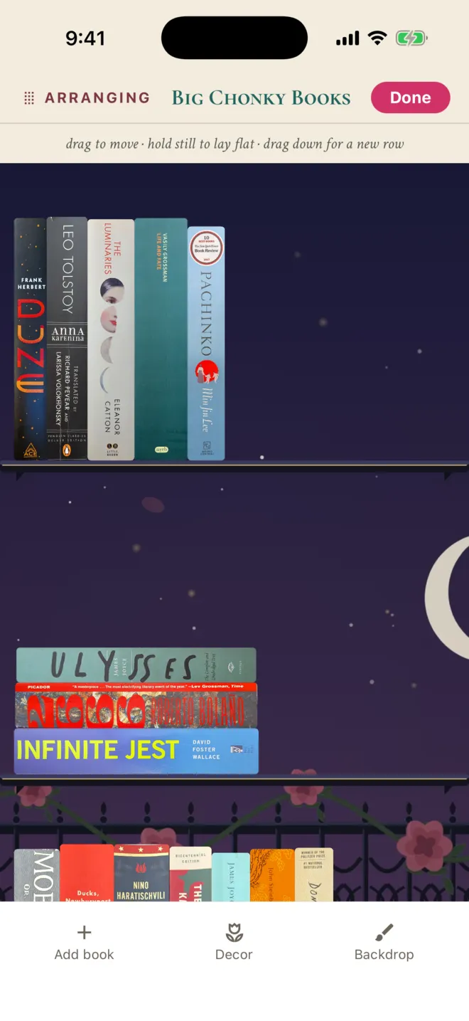 ShelfLife Arrange mode with standing books, a flat stack, gesture hints, and book, decor and backdrop tools